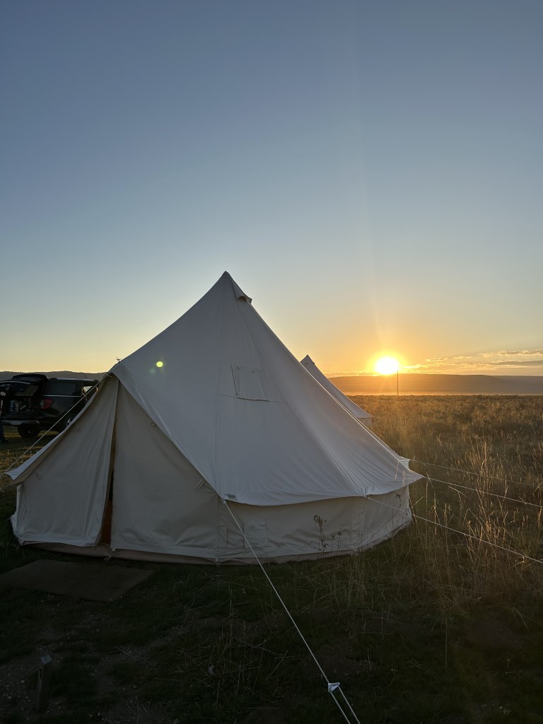 Wander Camp Yellowstone, Rustic Glamping, Montana Travel, Off-Grid Camping, Nature Retreat, King Tent, Glamping Experience, Cozy Comforts, Immersive Outdoor Stay, Off-Grid Living, Communal Bathrooms, Stargazing, Off-Grid Accommodations, Outdoor Adventure, Nature Enthusiast, Wilderness Retreat, Outdoor Living, Unplugged Getaway, Unique Accommodation, Solar-Powered Lighting, Furry Friends Welcome, Rain or Shine Camping, USB Battery Charger, Additional Comforts, Adventure Add-Ons, Cozy King Bed, Nature Getaway, Rustic Charm, Glamping Near Yellowstone, West Yellowstone, Off-the-Grid Adventure, Sustainable Travel, Wilderness Escape,