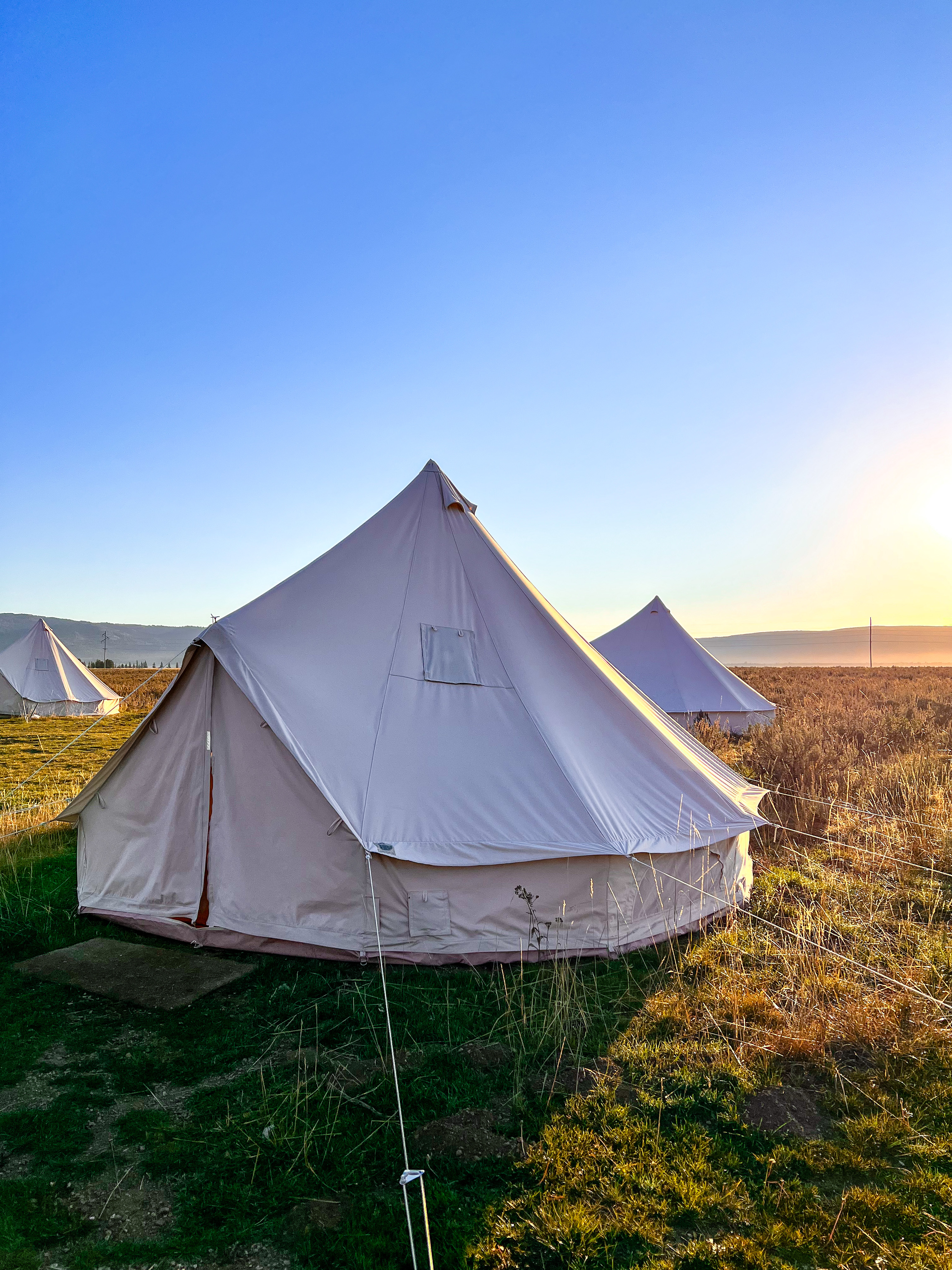 Wander Camp Yellowstone, Rustic Glamping, Montana Travel, Off-Grid Camping, Nature Retreat, King Tent, Glamping Experience, Cozy Comforts, Immersive Outdoor Stay, Off-Grid Living, Communal Bathrooms, Stargazing, Off-Grid Accommodations, Outdoor Adventure, Nature Enthusiast, Wilderness Retreat, Outdoor Living, Unplugged Getaway, Unique Accommodation, Solar-Powered Lighting, Furry Friends Welcome, Rain or Shine Camping, USB Battery Charger, Additional Comforts, Adventure Add-Ons, Cozy King Bed, Nature Getaway, Rustic Charm, Glamping Near Yellowstone, West Yellowstone, Off-the-Grid Adventure, Sustainable Travel, Wilderness Escape,