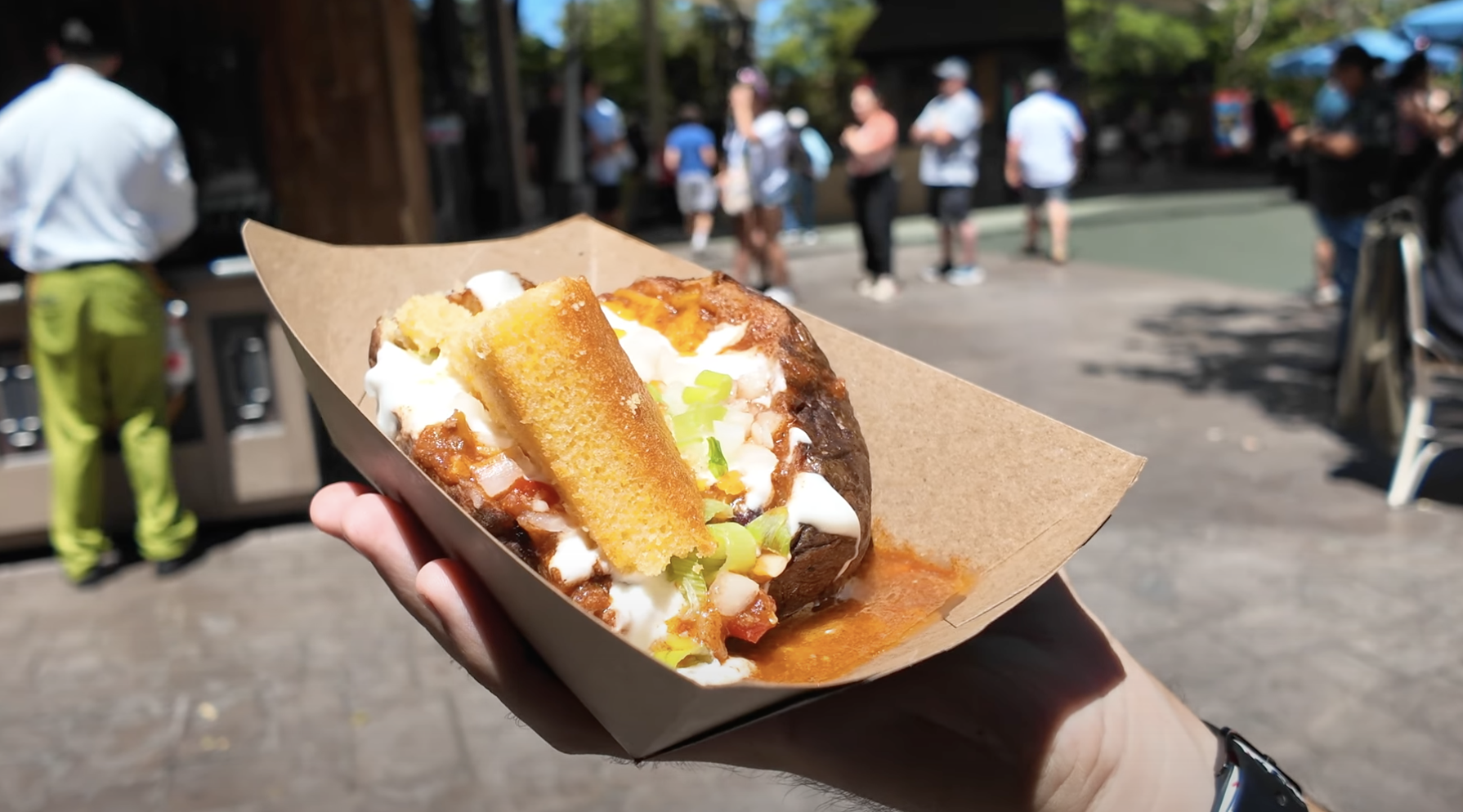 Disneyland 70th Anniversary Food, Disneyland Snacks, 70th Celebration Snacks, Disneyland Food Review, Disneyland 70th Anniversary Treats, Café Daisy Chicken Bacon Ranch Flop-Over, 70th Celebration Churro, Jolly Holiday Bakery Café Celebration Matterhorn Macaroon, Market House Mickey Hat Cookie, Red Rose Tavern 70th Stuff, 70th Celebration Macaron, Refreshment Corner Pulled Pork Mac and Cheese in a Bread Bowl, Tiana’s Palace House-filled Celebration Beignet, Troubadour Tavern W.E.D. Chili Cheese Baked Potato, Troubadour Tavern Chicken Pot Pie Baked Potato, Troubadour Tavern Tiramisu Cold Brew, Hollywood Lounge Celebration Cocktail, Hollywood Lounge Pink Dragon Fruit Mimosa, Schmoozies Mickey-shaped Celebration Waffles, Disneyland Celebration Snacks 2023, Disneyland Food Guide, Disneyland Special Drinks, Disneyland Bakery Items, Disneyland Menu Highlights, Disneyland Sweet Treats, Disneyland Savory Snacks, Disneyland Party Foods, Disneyland Anniversary Eats