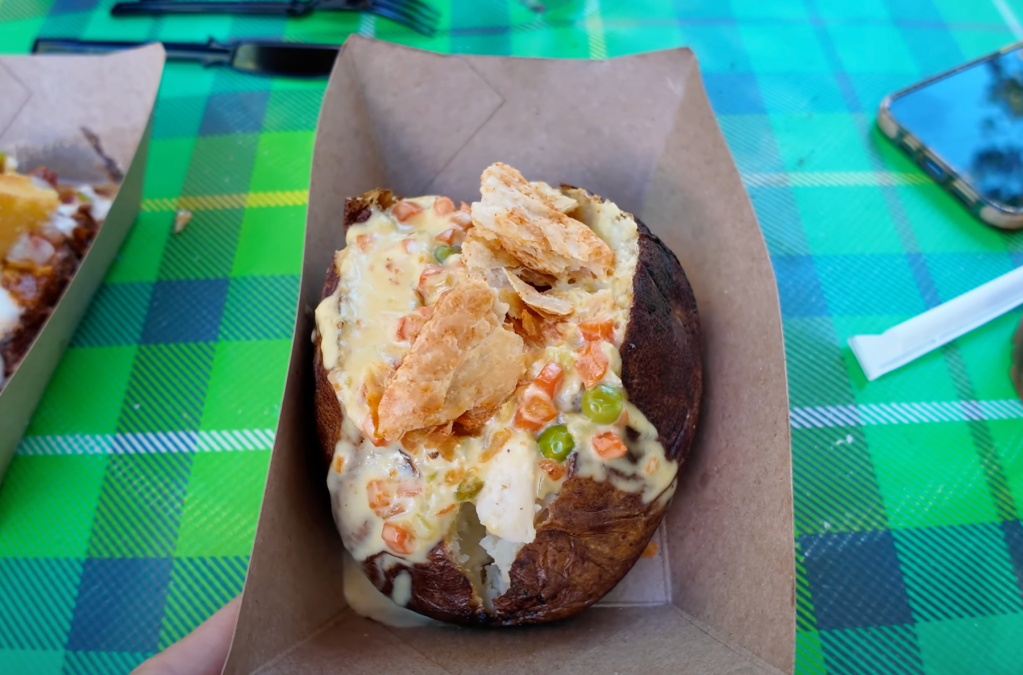 Disneyland 70th Anniversary Food, Disneyland Snacks, 70th Celebration Snacks, Disneyland Food Review, Disneyland 70th Anniversary Treats, Café Daisy Chicken Bacon Ranch Flop-Over, 70th Celebration Churro, Jolly Holiday Bakery Café Celebration Matterhorn Macaroon, Market House Mickey Hat Cookie, Red Rose Tavern 70th Stuff, 70th Celebration Macaron, Refreshment Corner Pulled Pork Mac and Cheese in a Bread Bowl, Tiana’s Palace House-filled Celebration Beignet, Troubadour Tavern W.E.D. Chili Cheese Baked Potato, Troubadour Tavern Chicken Pot Pie Baked Potato, Troubadour Tavern Tiramisu Cold Brew, Hollywood Lounge Celebration Cocktail, Hollywood Lounge Pink Dragon Fruit Mimosa, Schmoozies Mickey-shaped Celebration Waffles, Disneyland Celebration Snacks 2023, Disneyland Food Guide, Disneyland Special Drinks, Disneyland Bakery Items, Disneyland Menu Highlights, Disneyland Sweet Treats, Disneyland Savory Snacks, Disneyland Party Foods, Disneyland Anniversary Eats