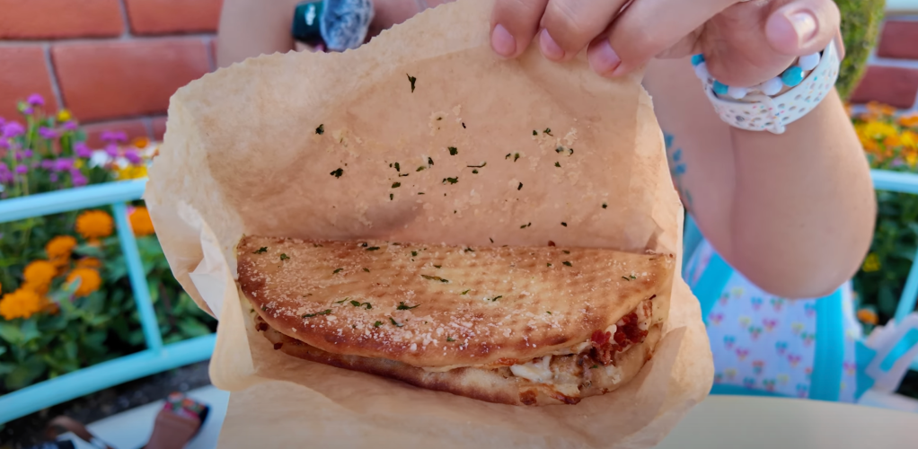 Disneyland 70th Anniversary Food, Disneyland Snacks, 70th Celebration Snacks, Disneyland Food Review, Disneyland 70th Anniversary Treats, Café Daisy Chicken Bacon Ranch Flop-Over, 70th Celebration Churro, Jolly Holiday Bakery Café Celebration Matterhorn Macaroon, Market House Mickey Hat Cookie, Red Rose Tavern 70th Stuff, 70th Celebration Macaron, Refreshment Corner Pulled Pork Mac and Cheese in a Bread Bowl, Tiana’s Palace House-filled Celebration Beignet, Troubadour Tavern W.E.D. Chili Cheese Baked Potato, Troubadour Tavern Chicken Pot Pie Baked Potato, Troubadour Tavern Tiramisu Cold Brew, Hollywood Lounge Celebration Cocktail, Hollywood Lounge Pink Dragon Fruit Mimosa, Schmoozies Mickey-shaped Celebration Waffles, Disneyland Celebration Snacks 2023, Disneyland Food Guide, Disneyland Special Drinks, Disneyland Bakery Items, Disneyland Menu Highlights, Disneyland Sweet Treats, Disneyland Savory Snacks, Disneyland Party Foods, Disneyland Anniversary Eats